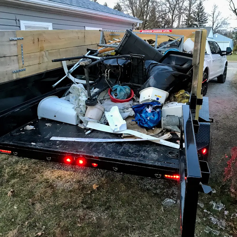 Roll-off dumpster delivered to a residential driveway in Keokuk