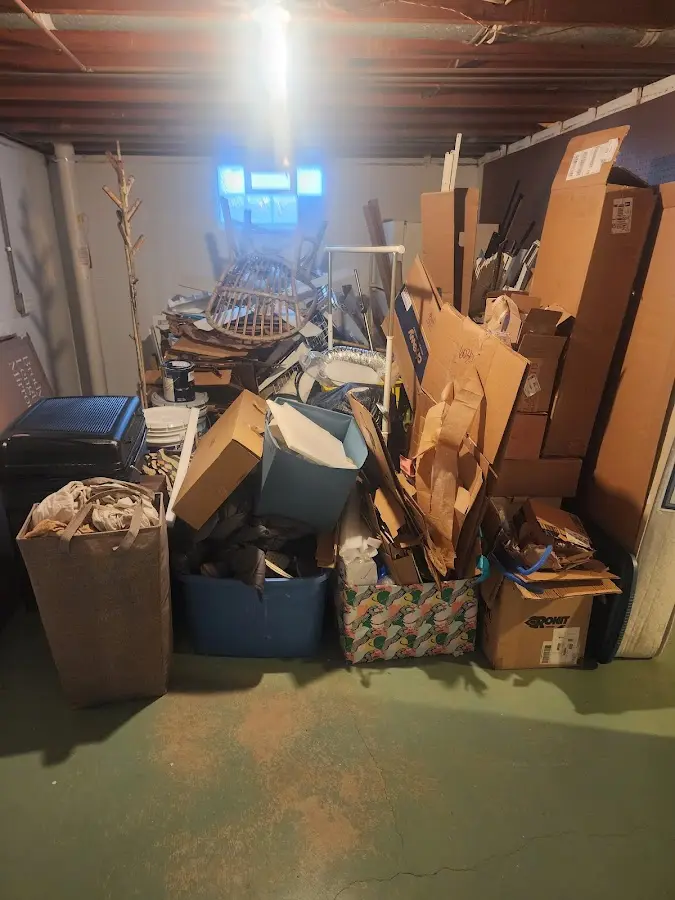 Roll-off dumpster container at job site for Yard Waste Dumpster Rental in Keokuk